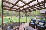 Great outdoor space with a covered deck overlooking the backyard